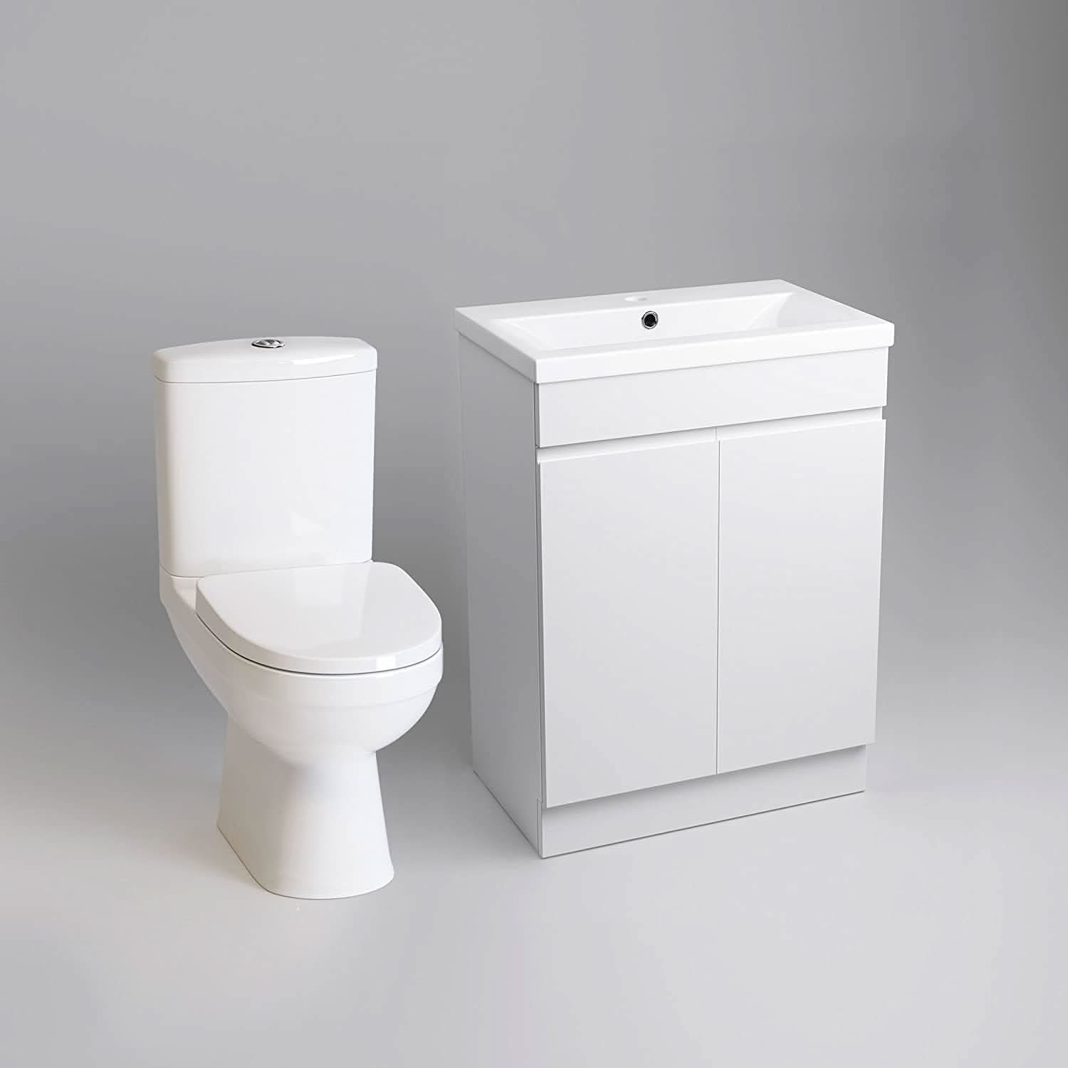 The iBathUK Trent Close Coupled Toilet & Vanity Unit with Basin features sleek lines, a gloss white finish, and two cabinet doors—a modern, space-saving bathroom furniture combo set against a plain light gray background.