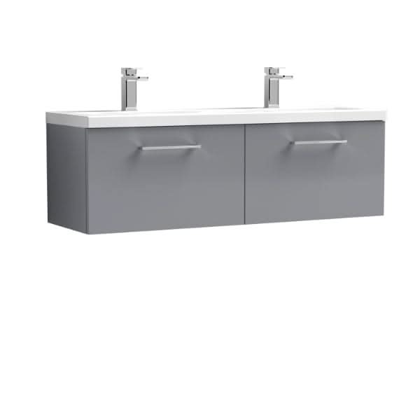 The Nuie Arno 2 Drawer Wall Hung Vanity Unit with Double Ceramic Basin (1200mm wide) features a modern gray finish, two drawers with metal handles, a white countertop, and twin chrome faucets—perfect for contemporary bathrooms.