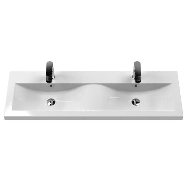The Nuie Arno 4 Drawer Wall Hung Vanity Unit features a 1200mm wide double white ceramic basin, each with its own faucet, set in a rectangular countertop for a sleek, modern look.