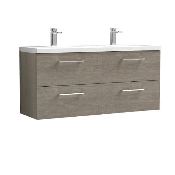 The Nuie Arno 4 Drawer Wall Hung Vanity Unit by Nuie features a modern wood finish, four drawers with metal handles, and a white double ceramic basin (1200mm wide) with two chrome faucets.