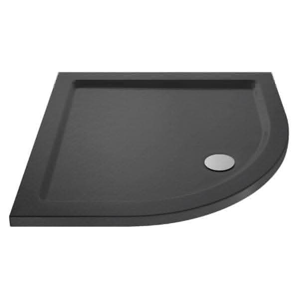 A slate grey Nuie Quadrant Shower Tray with a raised edge and a round silver drain near the curved front corner.