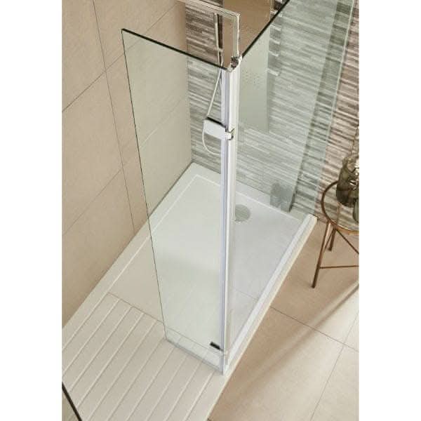 Overhead view of a modern bathroom with a Nuie Wetroom Return Screen by Nuie, white shower tray, beige tiled walls and floor, and a small round stool beside the shower area.