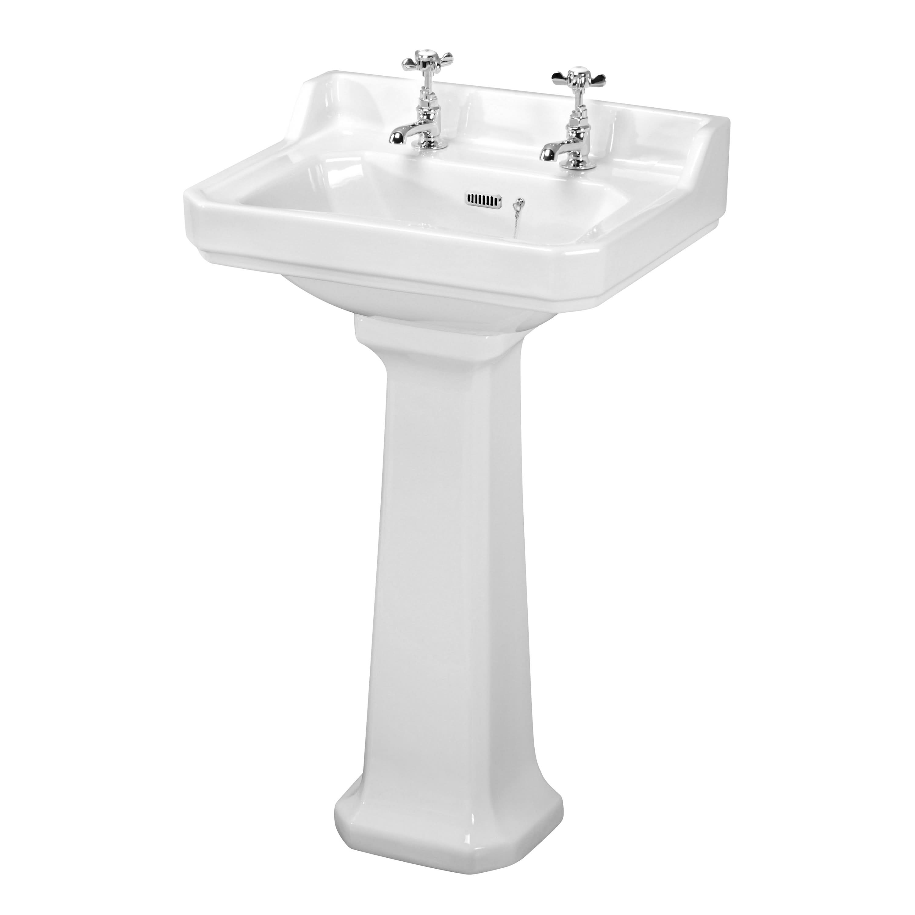 The Nuie Carlton 560mm Full Pedestal Basin - 2 TH in white by Nuie features a rectangular basin, two tap holes for separate hot and cold faucets, and a durable full pedestal base, crafted from vitreous china.