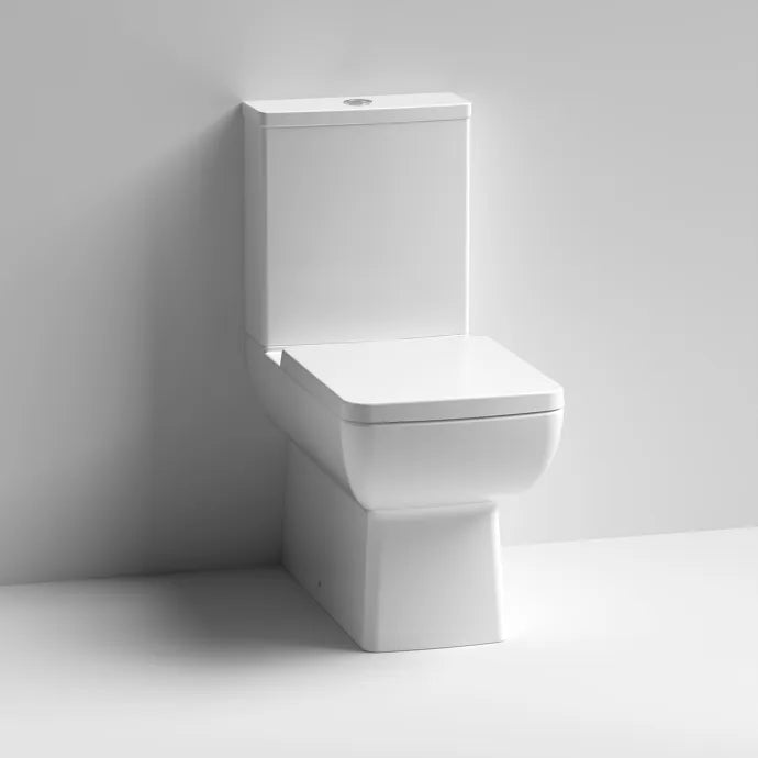 Mira Close Coupled Toilet with Push Button Cistern & Seat Options - White