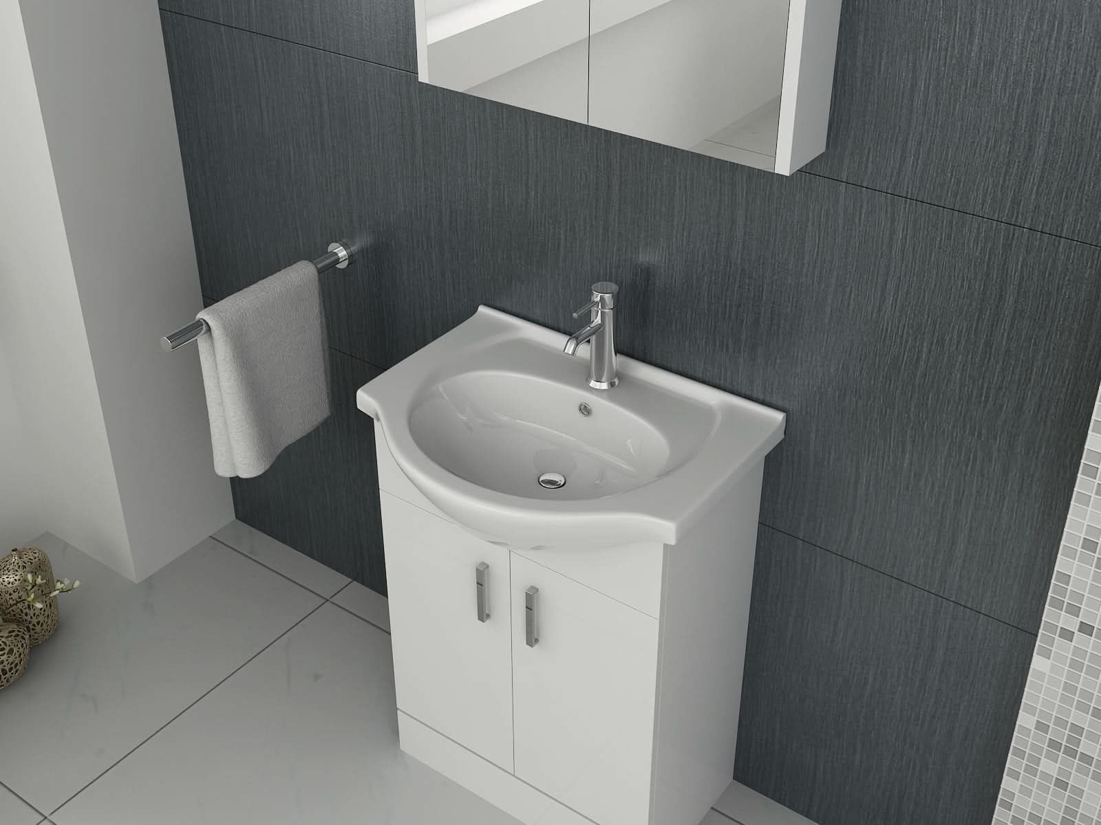 The iBathUK Quartz MDF Gloss White Vanity Unit with Basin features a modern white sink and chrome faucet, set in a moisture-resistant gloss white cabinet. A hand towel hangs nearby and a mirror is mounted above, contrasting the dark textured wall.