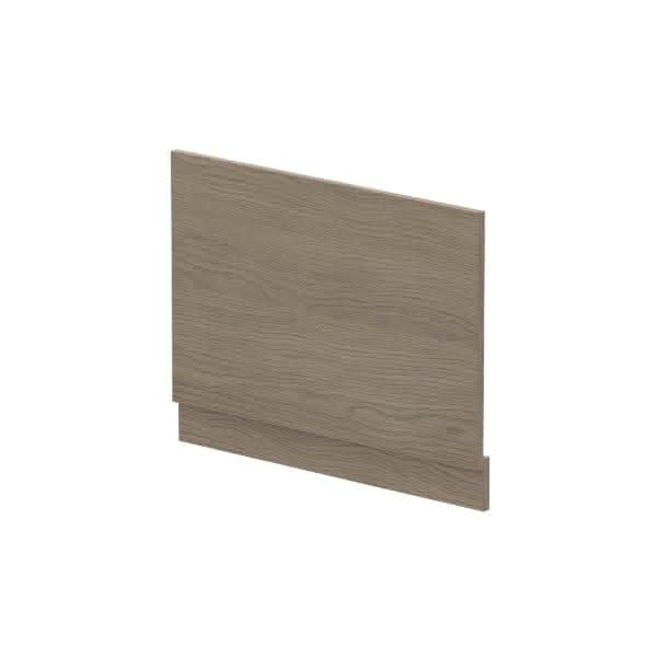 The Nuie 750mm Straight Shower Bath End Panel With Plinth is a rectangular, wood-textured bath end panel in light brown, featuring a thicker base plinth along the bottom edge and shown against a white background.