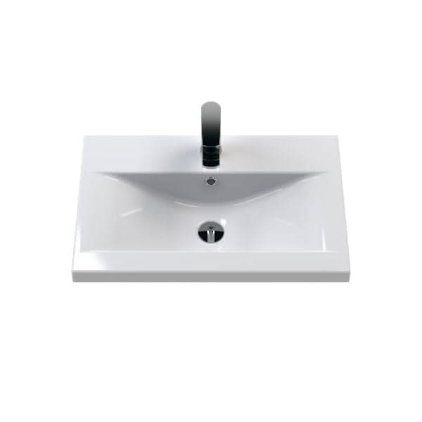 The Nuie Arno 2 Drawer Floorstanding Vanity Unit With Basin-4 (600mm wide) features a rectangular white ceramic basin with a central drain and single-hole black faucet—ideal for stylish, modern bathrooms.