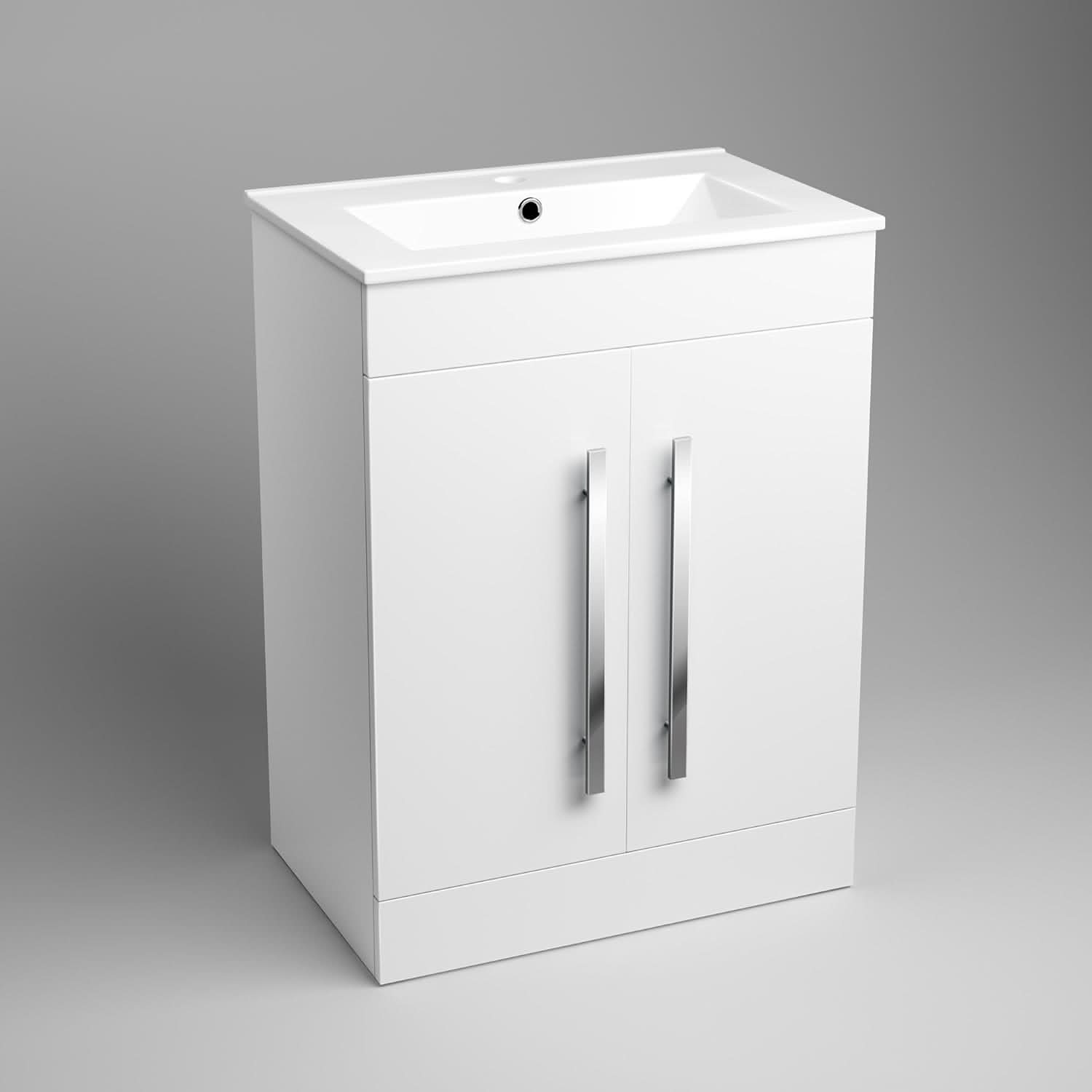 The iBathUK Arvon Shower Bath Suite features a gloss white vanity basin unit with a rectangular basin and two vertical silver-handled doors, paired with a straight bathtub, glass screen, and close coupled toilet against a plain gray backdrop.